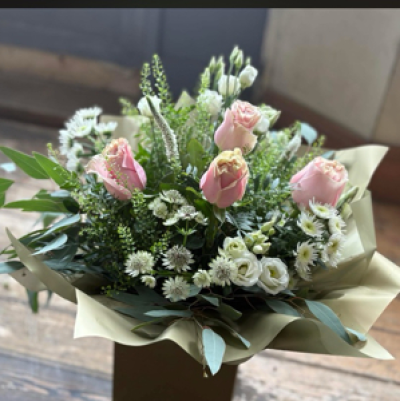 Pastel garden style - Beautiful arrangement of soft pastel colours with complimentary foliage 