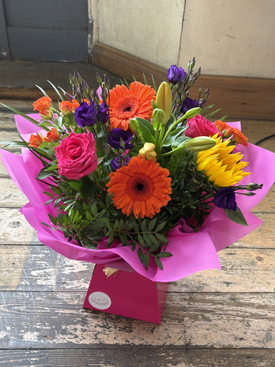 Bright & Vibrant - Beautiful bright and bold blooms giving you a vibrant vibe. 

Flowers subject to availability.